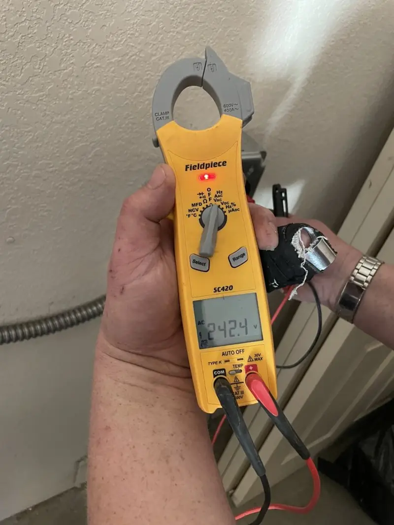 Voltage testing with clamp meter during Ceiling Fan Installation in Yreka
